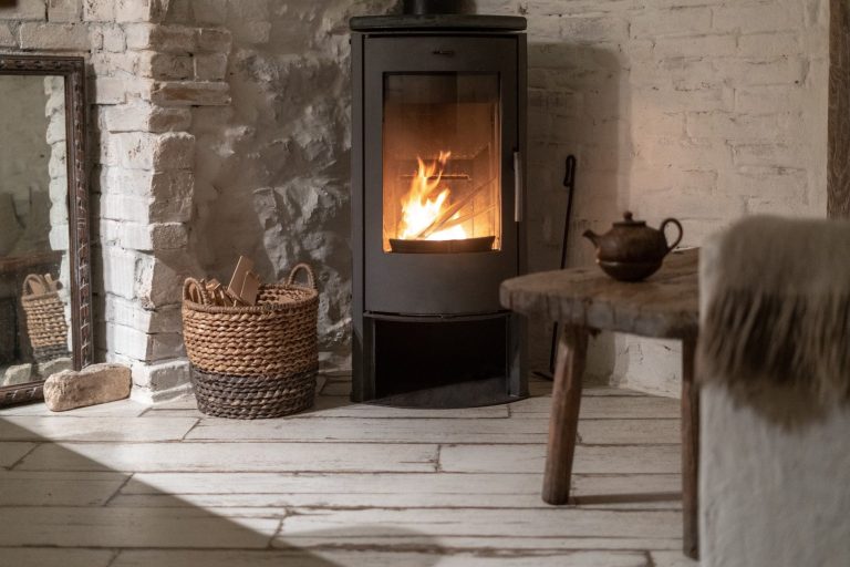 Freestanding log burner in room